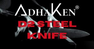 AdhaKen D2 steel knife blade on steel surface, showcasing the best knife material for durability and sharpness.